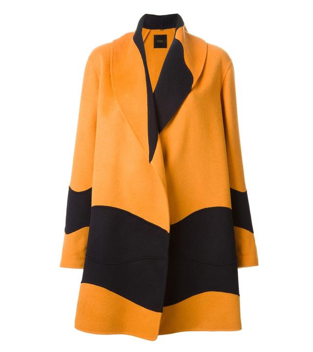 <a href='http://www.china1f.com' target='_blank'>服装</a>流行趋势不改 大衣长盛不衰