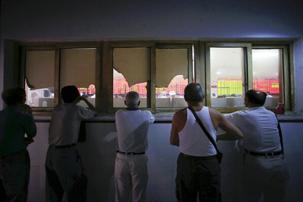 股市热潮中有多少人的生活被改变了-图片新闻