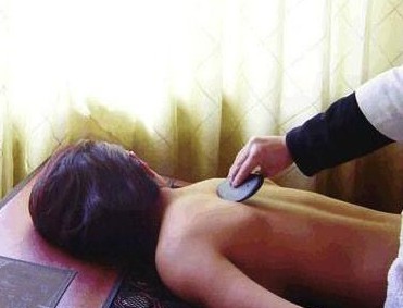 砭石疗法的作用是什么