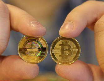 比特币价格已近一盎司黄金价格