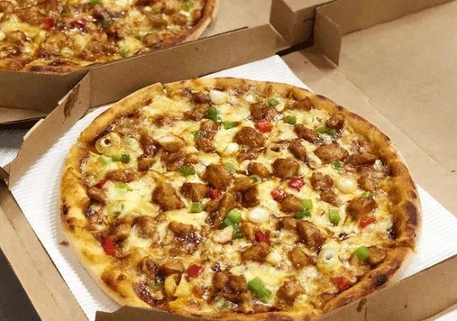 七年增长三倍的中国比萨市场 在对餐馆老板说什么?