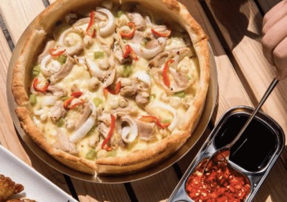 七年增长三倍的中国比萨市场 在对餐馆老板说什么?