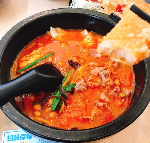 大鼓米线:百煮仍有骨 入口自分明